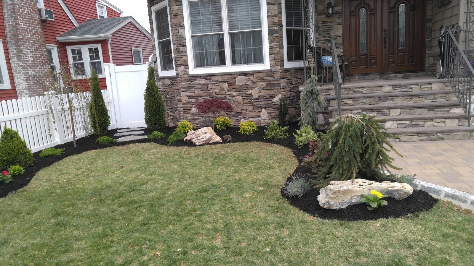 Long Island luxury landscape lighting and stonework.